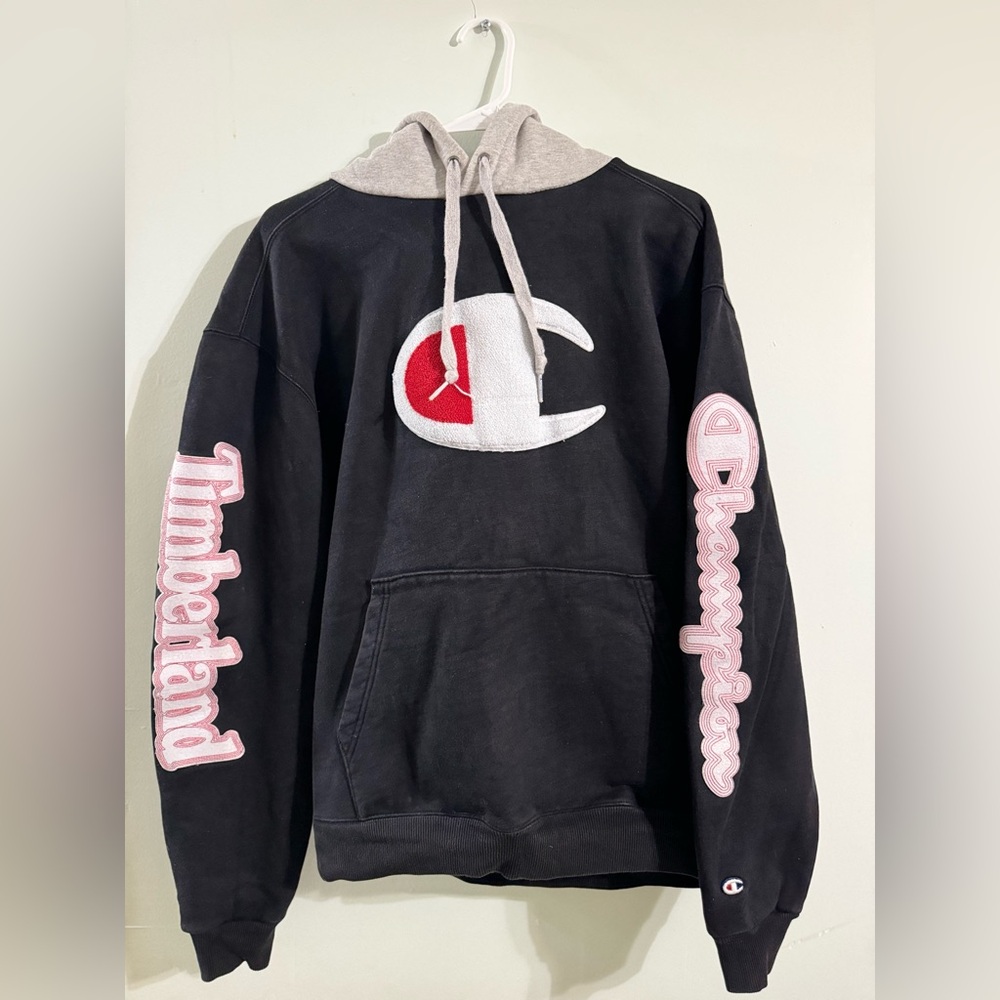 Large Timberland x Champion Hoodie: Comfortable, Stylish, Co-branded.